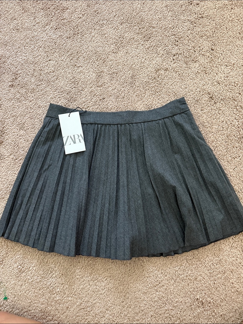 Grey pleated mini skirt